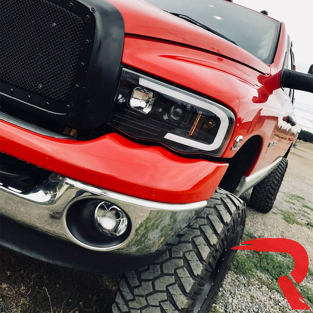 Dodge 02-05 RAM 1500/2500/3500 Projector Headlights OLED Halos & DRL - Multiple Styles