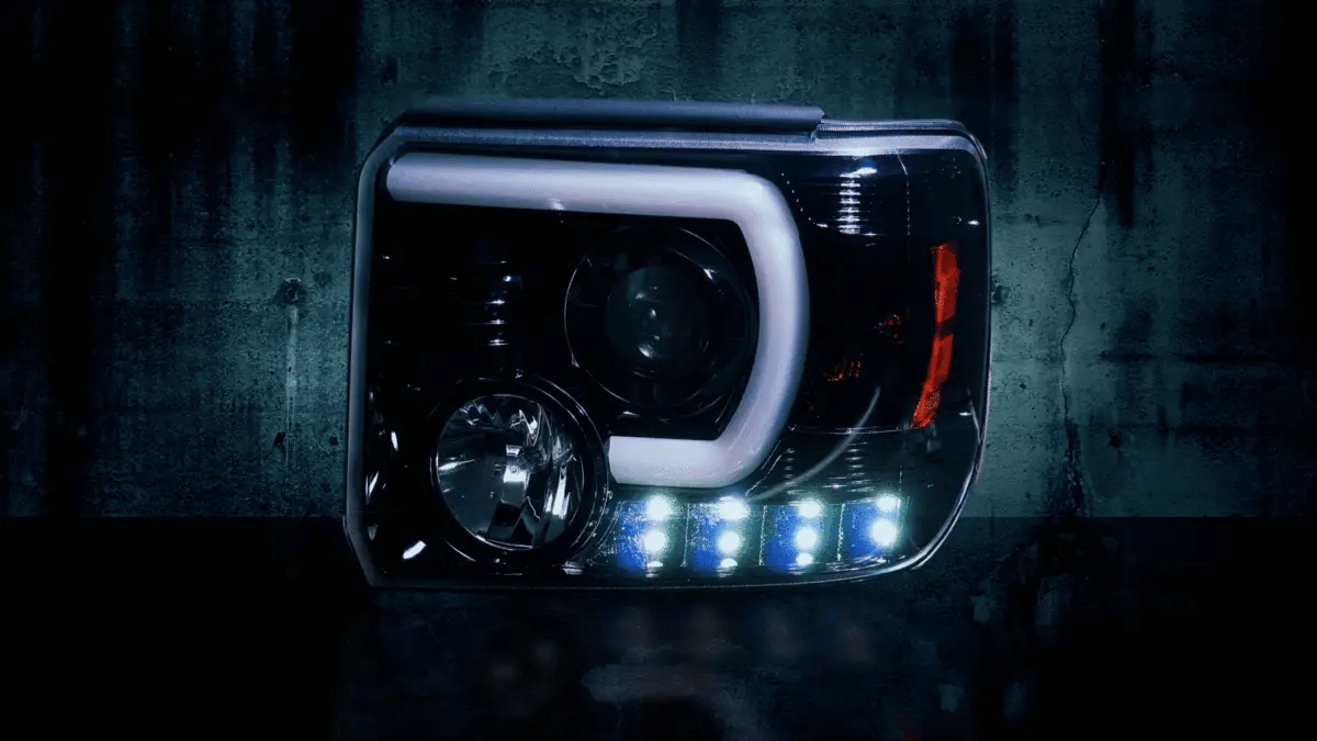 GMC Sierra 1500 14-18 Projector Headlights w OLED Amber DRLs & Scanning OLED Amber Turn Signals Smoked/Black