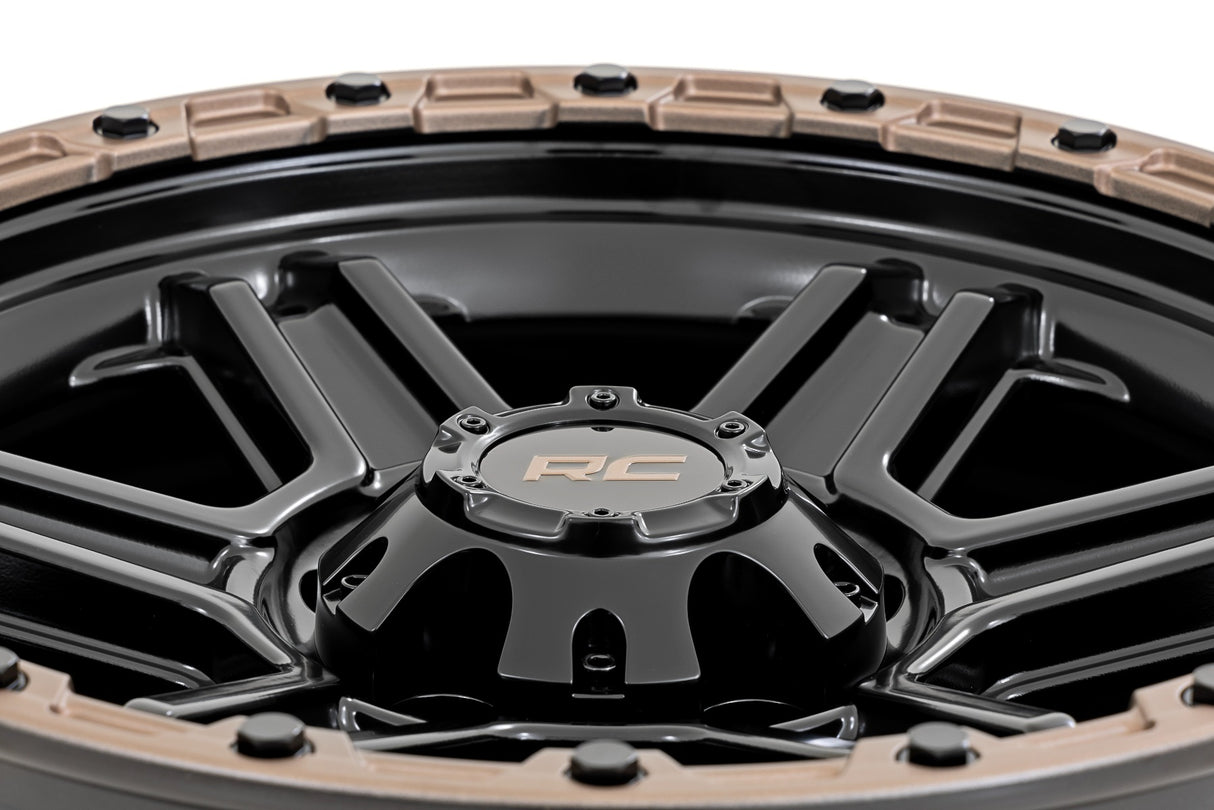 79 Series Wheel One-Piece Semi Gloss Black w/Bronze Ring 18x9 6x5.5 0mm Rough Country