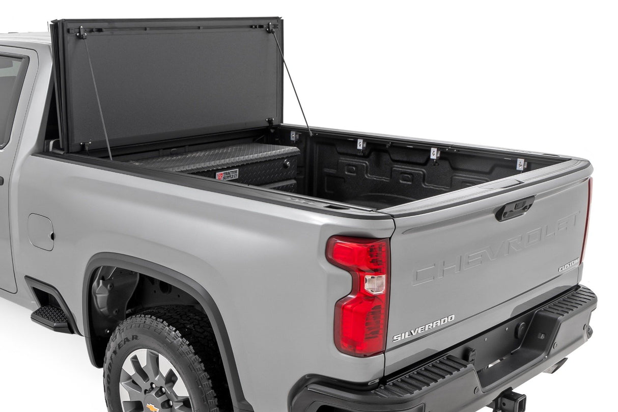 Hard Tri-Fold Flip Up Bed Cover | 6'9" Bed | Chevy/GMC Silverado/Sierra 2500HD/3500HD (20-24)