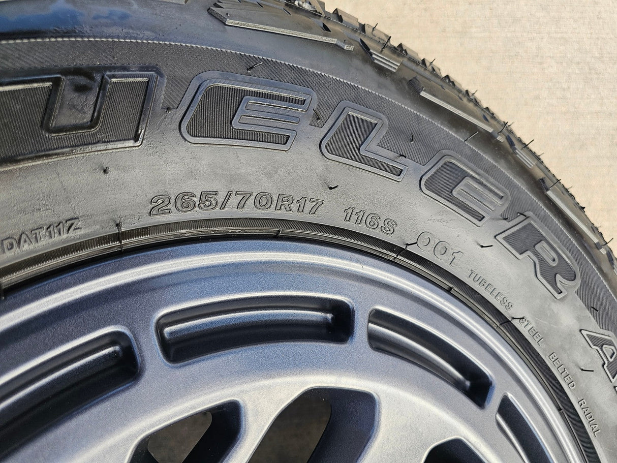 17" Nissan Frontier X-PRO OEM Desert Runner wheels rims tires DUELER A/T Texas Truck Tire