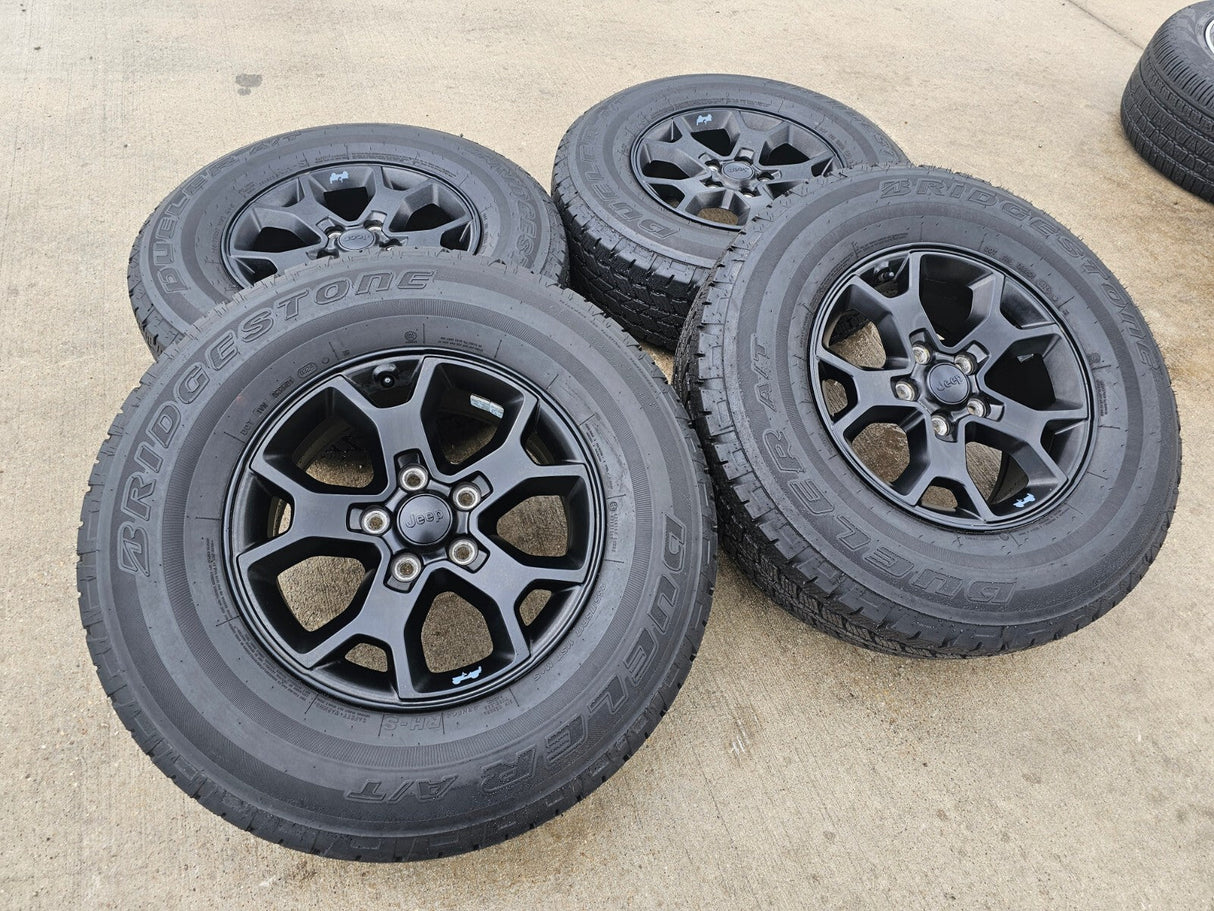17" Jeep Wrangler Rubicon OEM 9218 wheels rims Gladiator tires DUELER A/T Texas Truck Tire