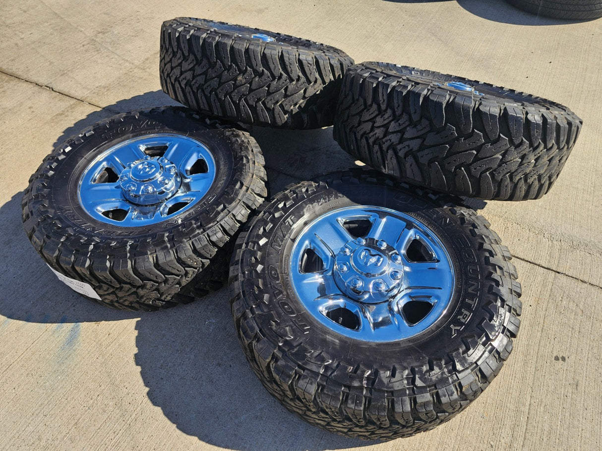 18" Dodge Ram 2500 3500 STEEL chrome OEM 2473 wheels rims TOYO M/T 35" Texas Truck Tire