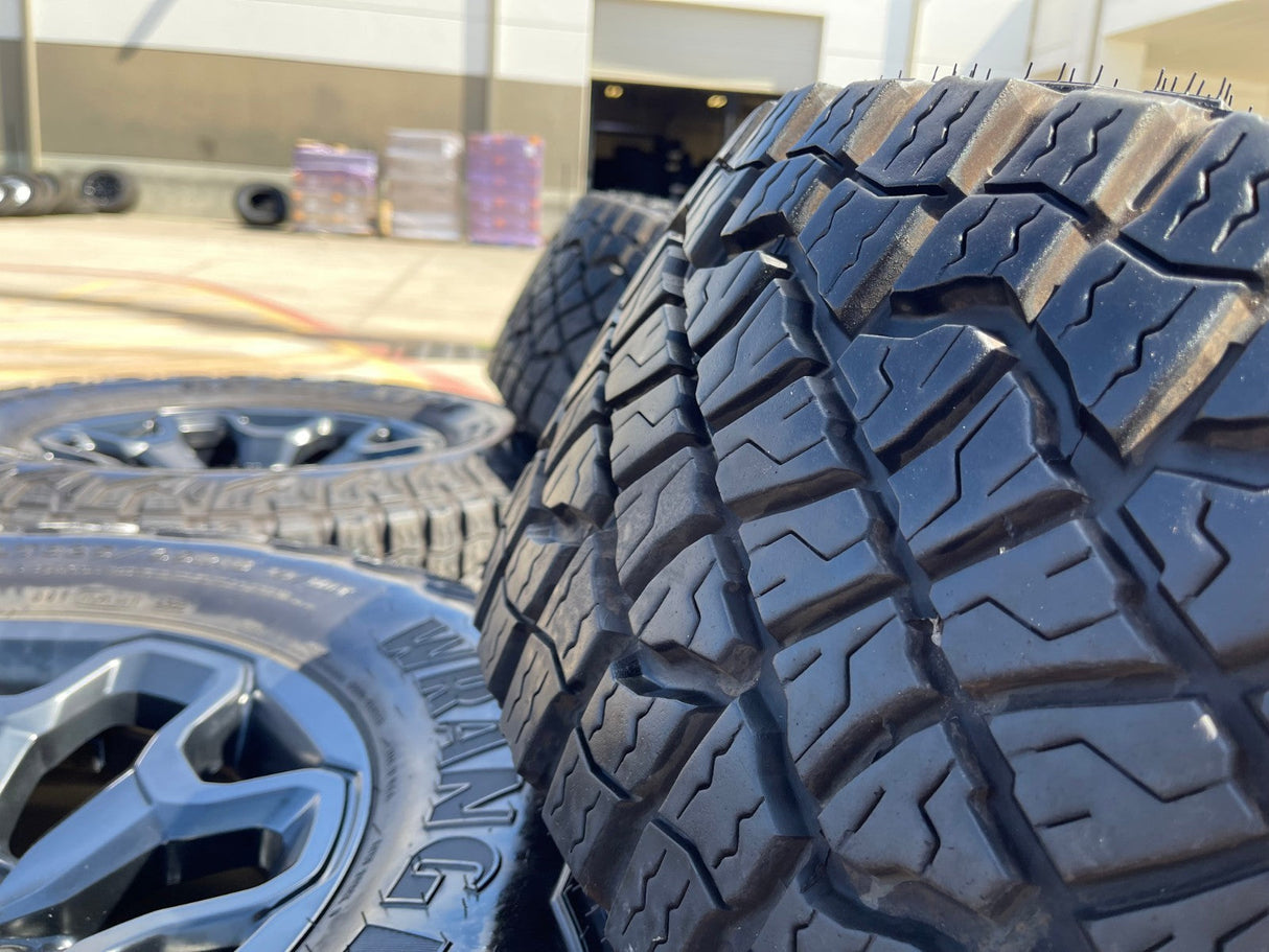 18" Dodge Ram 1500 TRX RHO Black OEM 66002 wheels rims TERRITORY M/T 35" Texas Truck Tire