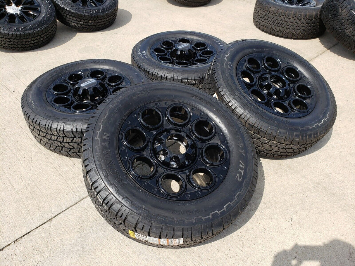 20" Ford F-250 F-350 OEM black TREMOR wheels rims 10299 10484 A/T2 tires NEW Texas Truck Tire