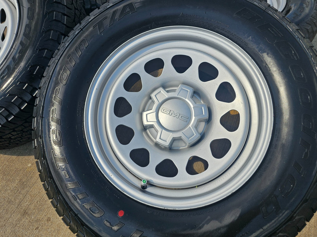 17" GMC Sierra Chevy Silverado OEM wheels rims tires 8130 Yukon NEW BFG A/T Texas Truck Tire
