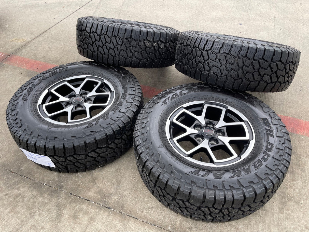 17" Jeep Wrangler Rubicon OEM 95730 9327 wheels rims Gladiator FALKEN A/T 33" Texas Truck Tire