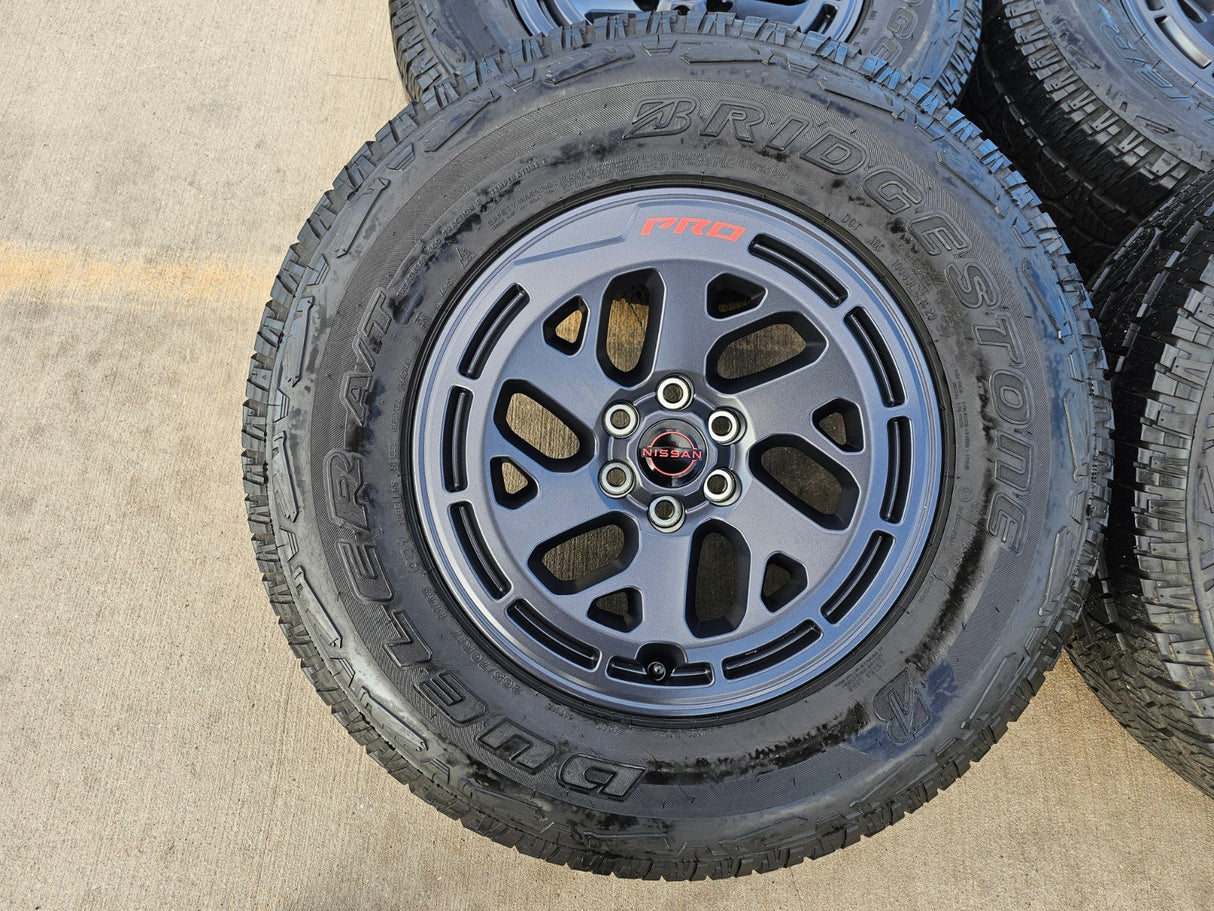 17" Nissan Frontier X-PRO OEM Desert Runner wheels rims tires DUELER A/T Texas Truck Tire