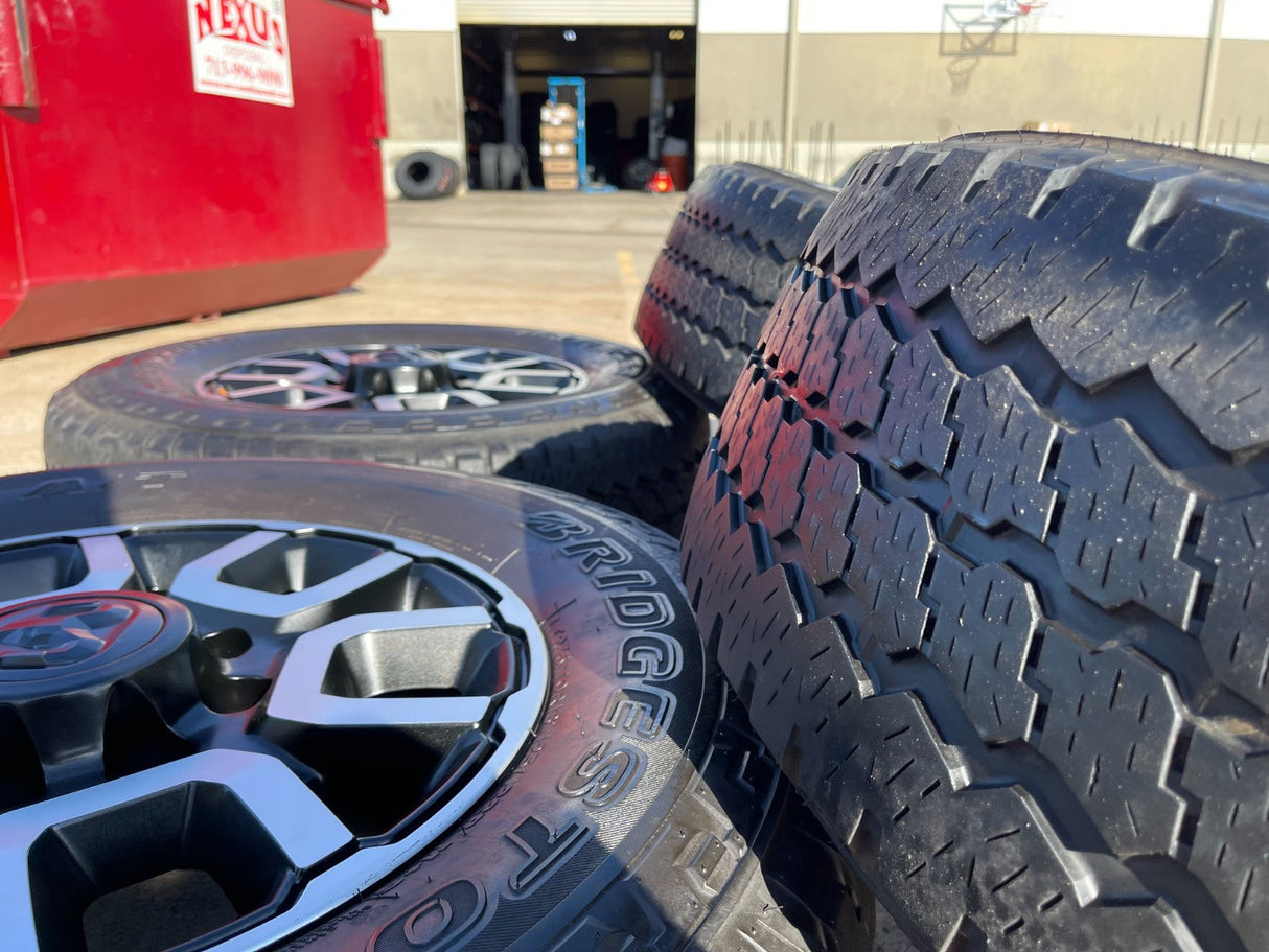 18" Ram 2500 3500 LARAMIE OEM wheels rims 2694 tires BRIDGESTONE A/T Texas Truck Tire