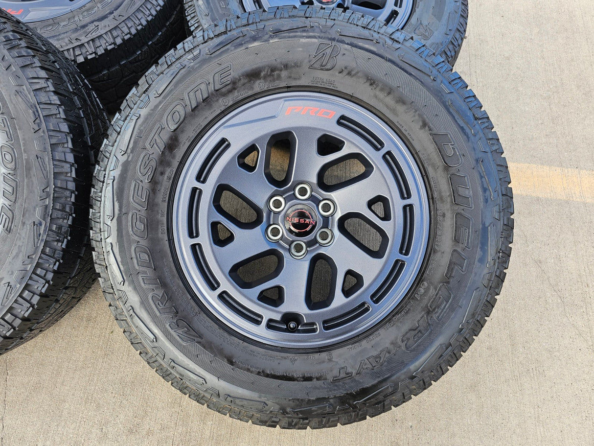 17" Nissan Frontier X-PRO OEM Desert Runner wheels rims tires DUELER A/T Texas Truck Tire
