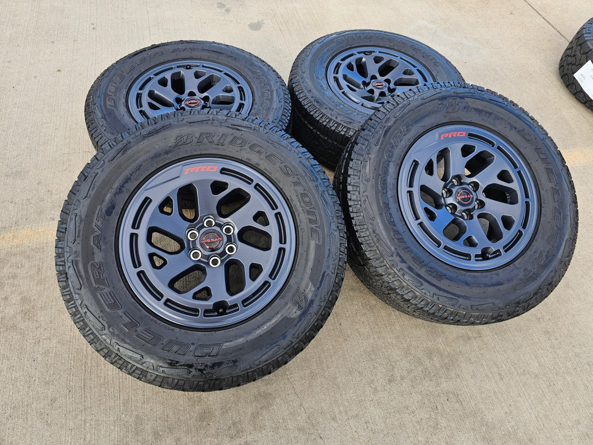 17" Nissan Frontier X-PRO OEM Desert Runner wheels rims tires DUELER A/T Texas Truck Tire