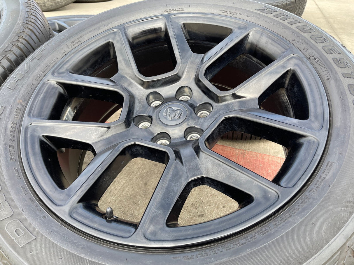 22" Dodge Ram 1500 OEM LIMITED Laramie wheels rims black 2725 2684 BRIDGESTONE Texas Truck Tire