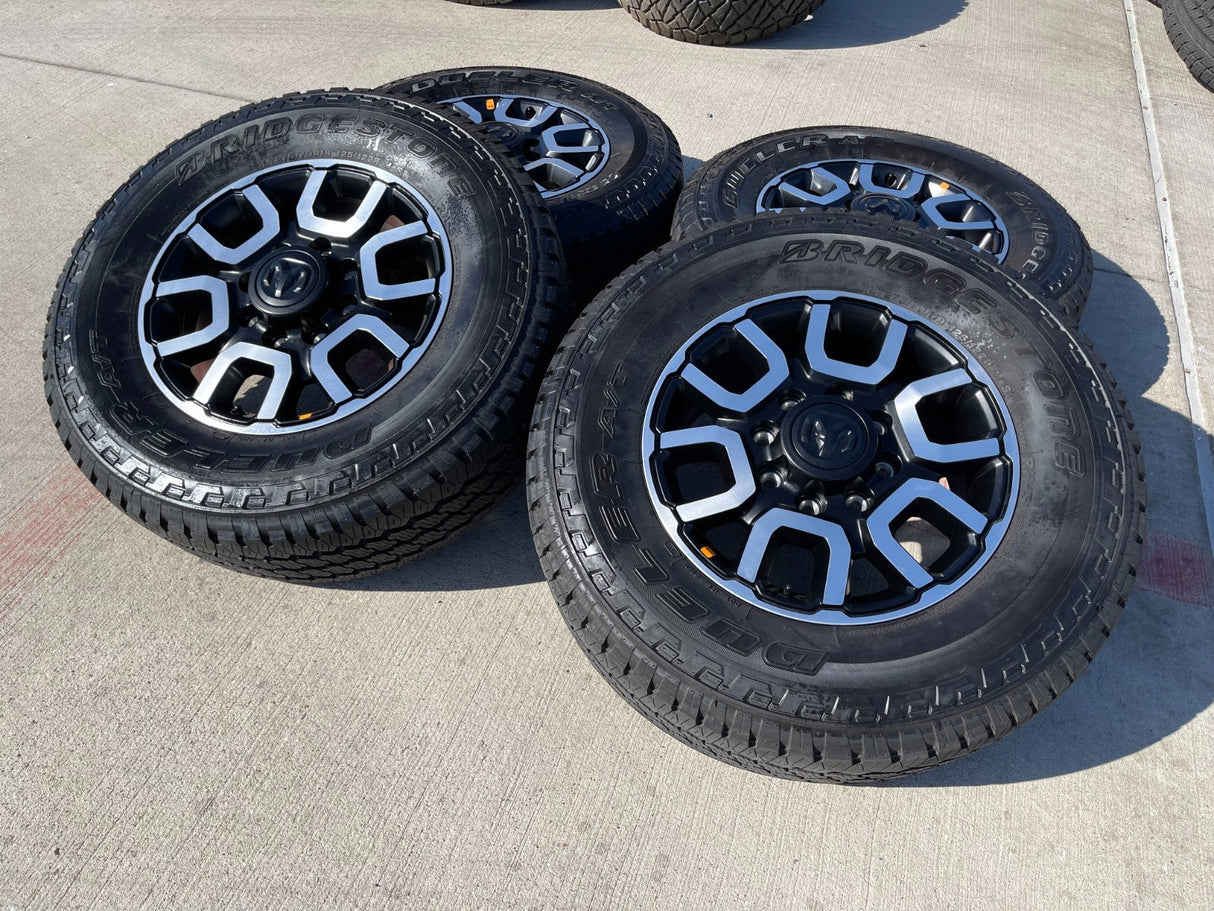 18" Ram 2500 3500 LARAMIE OEM wheels rims 2694 tires BRIDGESTONE A/T NEW 2026 Texas Truck Tire