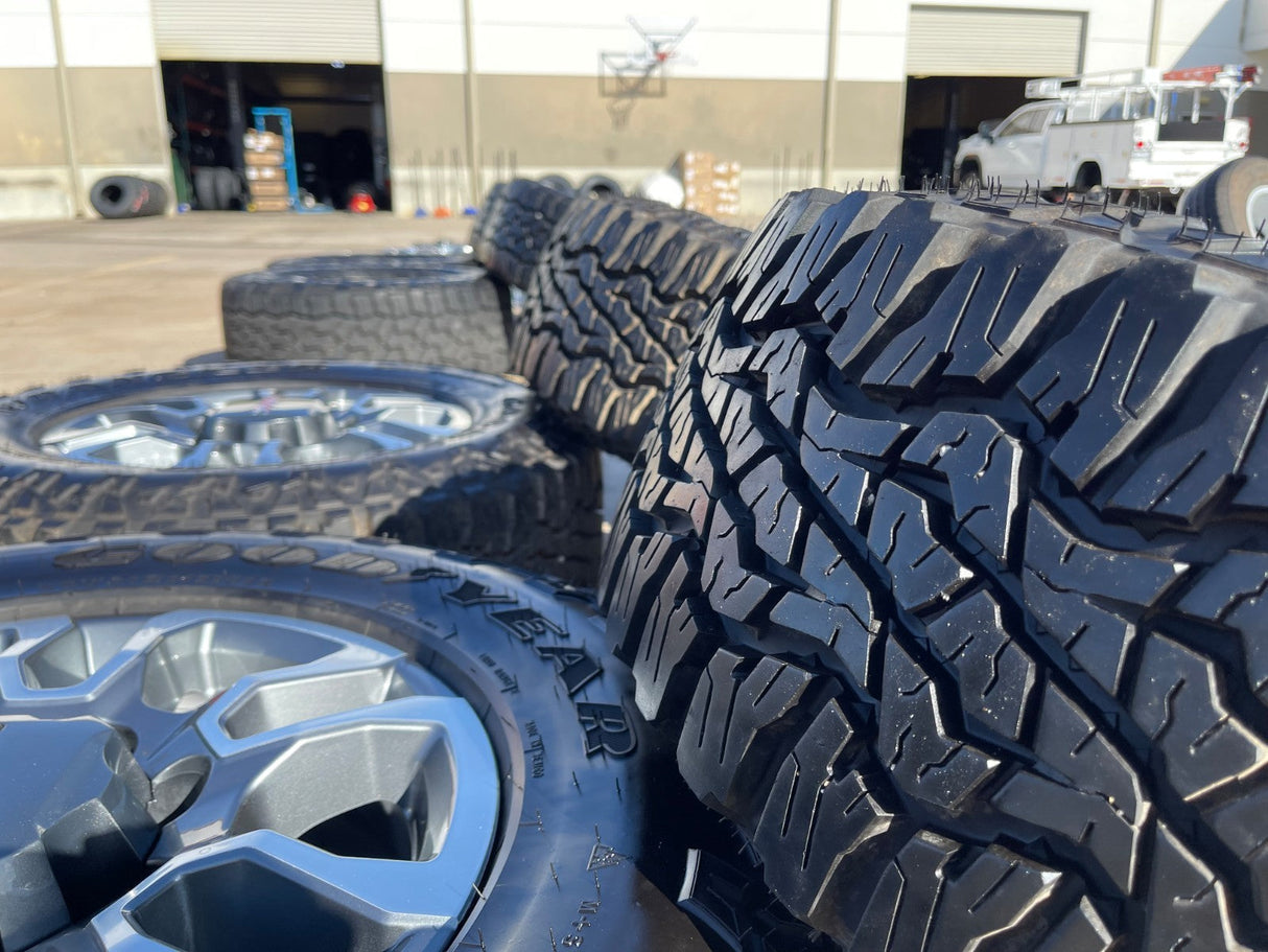 18" GMC Sierra AT4X Chevy Silverado 2500 3500 OEM 5949 wheels rims GOODYEAR A/T Texas Truck Tire
