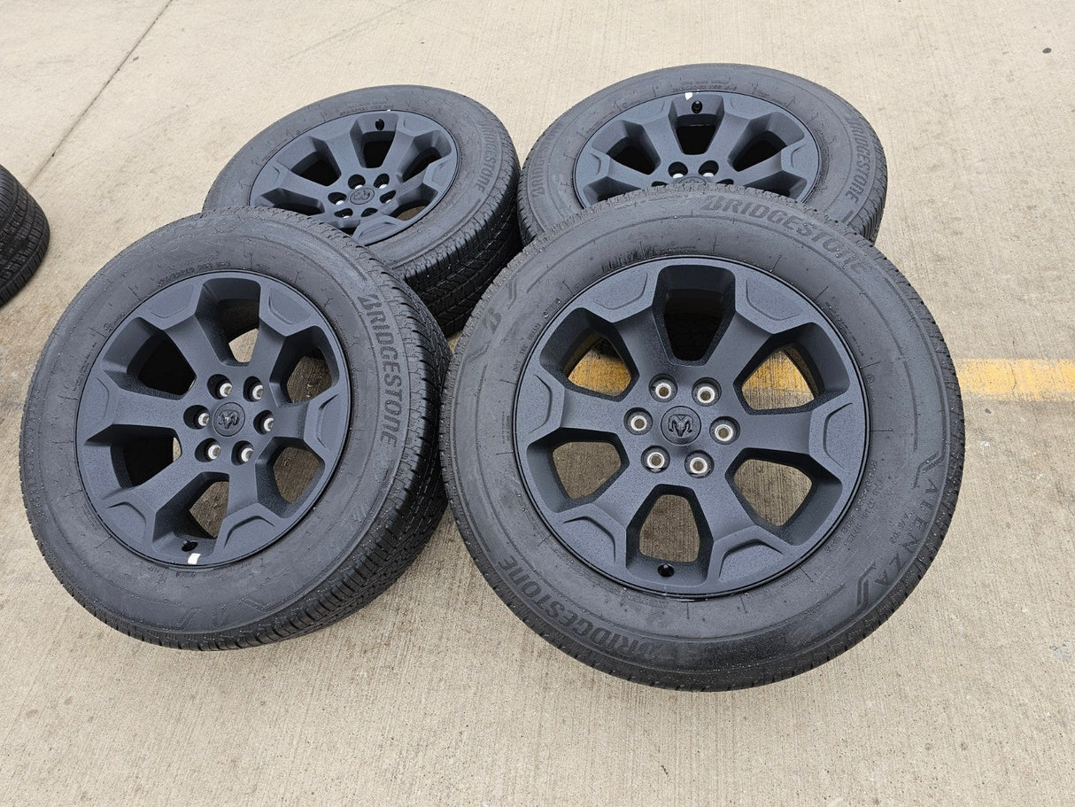 20" Dodge Ram 1500 OEM Laramie Black 2680 wheels rims 2024 2025 2026 BRIDGESTONE Texas Truck Tire