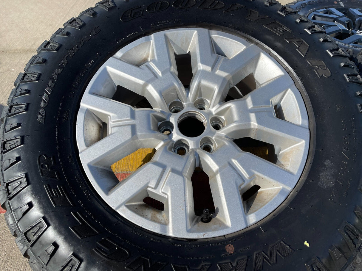 17" Nissan Frontier OEM Desert Runner 62832 wheels rims tires DURATRAC A/T Texas Truck Tire