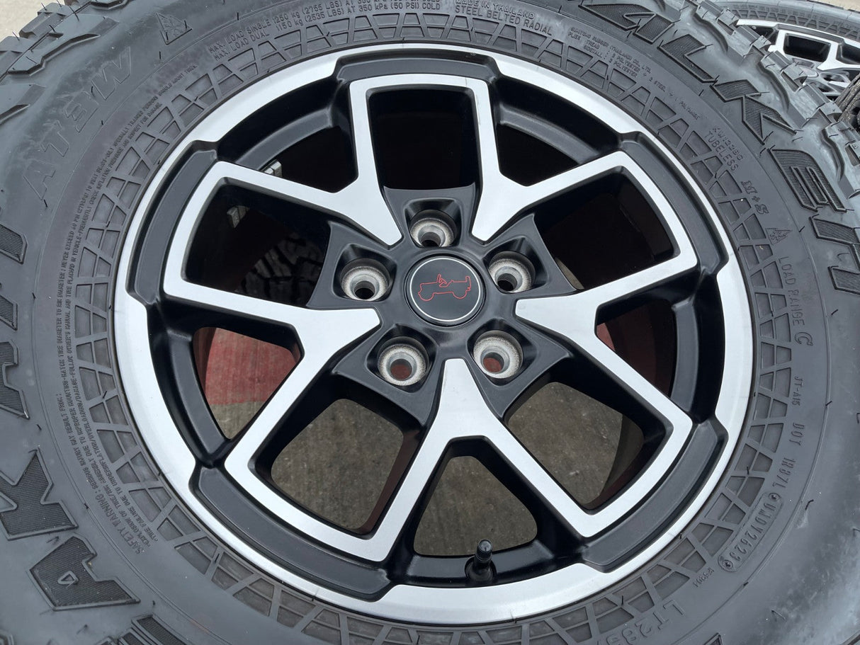 17" Jeep Wrangler Rubicon OEM 95730 9327 wheels rims Gladiator FALKEN A/T 33" Texas Truck Tire