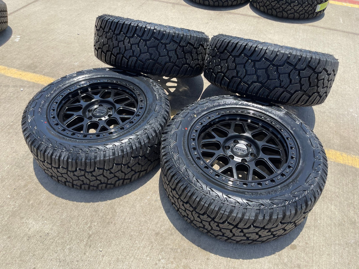 20x9 20" KMC KM549 Ford Expedition F-150 6x135 wheels rims tires 33" NEW Texas Truck Tire