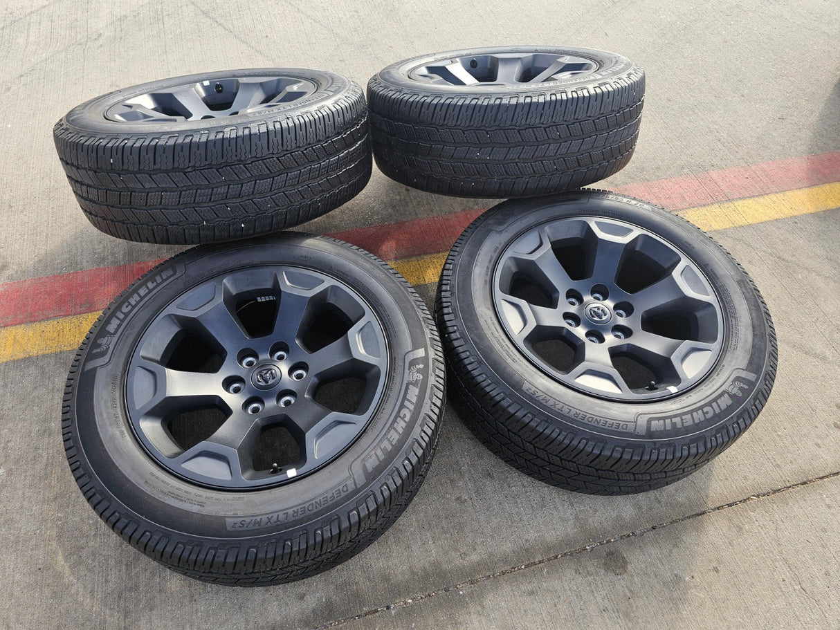 20" Dodge Ram 1500 OEM Laramie Black 2680 wheels rims 2024 2025 2026 MICHELIN Texas Truck Tire