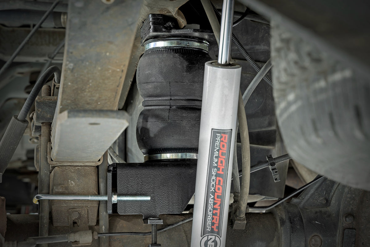 Air Spring Kit w/compressor Wireless Controller Ford F-250/F-350 Super Duty (05-16) Rough Country