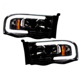 Dodge 02-05 RAM 1500/2500/3500 Projector Headlights OLED Halos & DRL - Multiple Styles