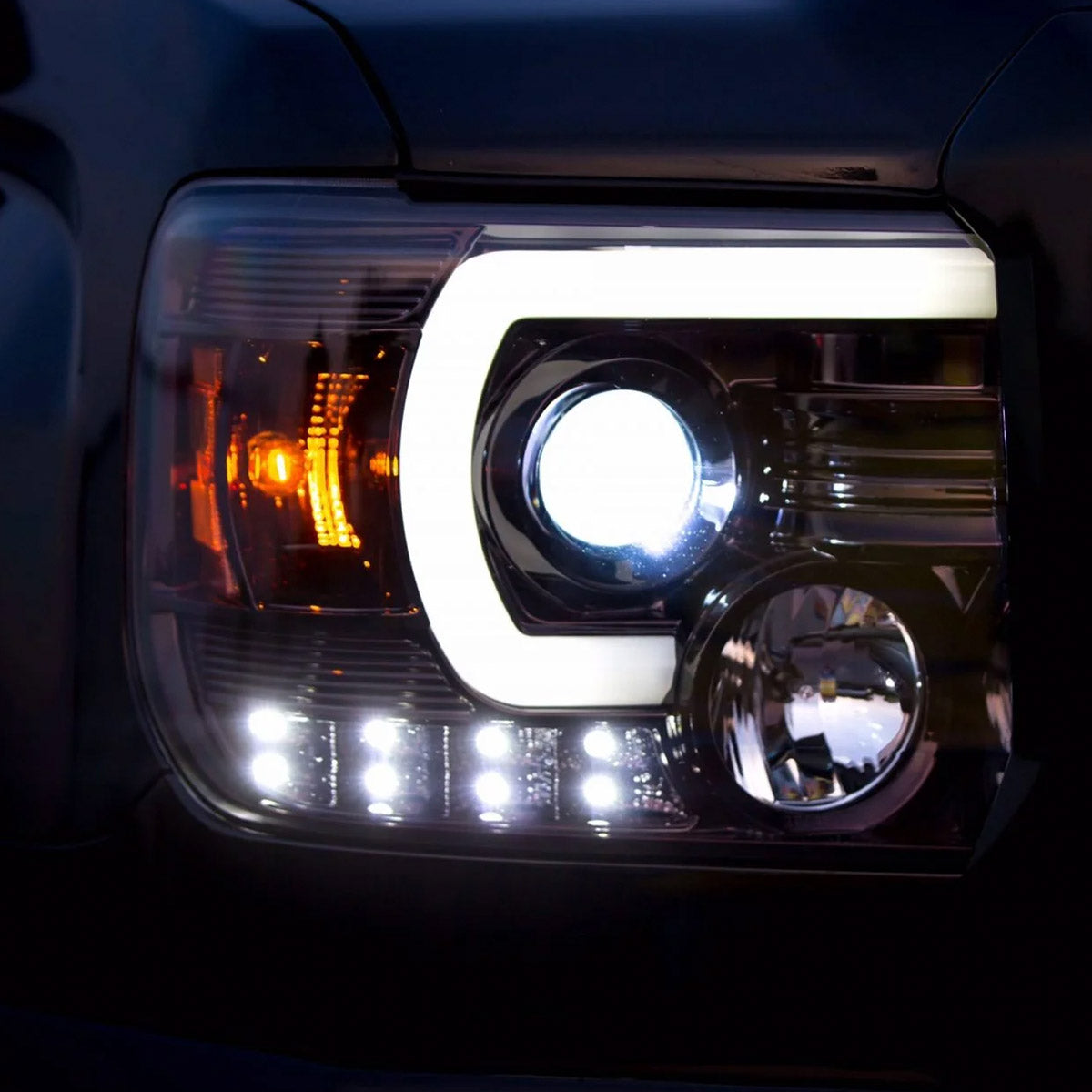 GMC Sierra & Denali 2500/3500 14-19 Single-Wheel HD Projector Headlights w Smooth OLED DRLs & Halos in Clear/Chrome