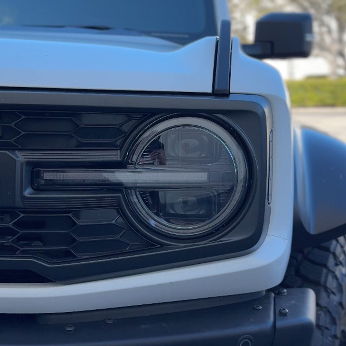 Ford Bronco 21-26 LED Projector Headlights w/ Ultra High Power LED High/Low Beams & White OLED DRL w/ Start-Up Lighting Sequence & Scanning Amber LED Turn Signals - Smoked / Black
