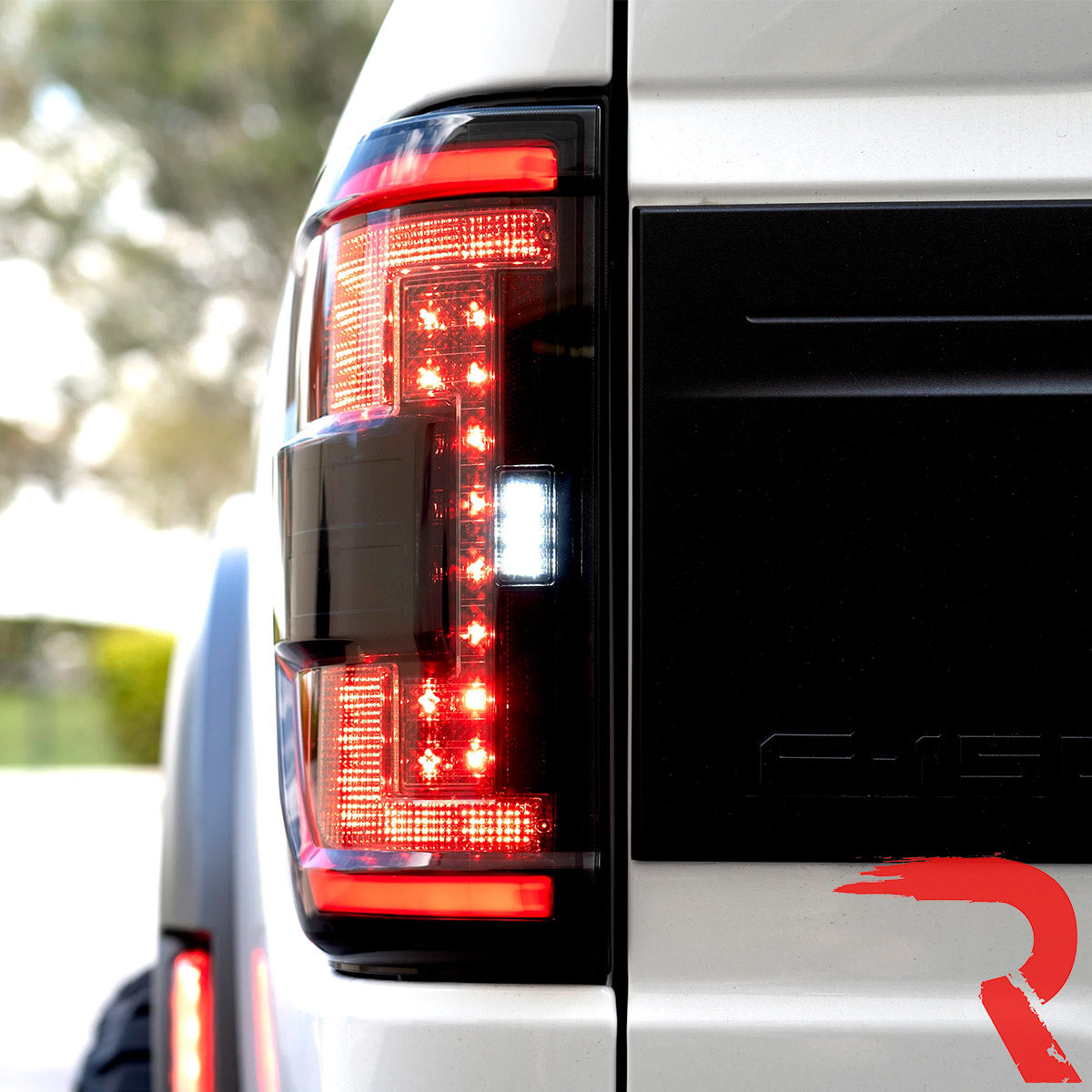 Ford F150 21-23 Ultra Bright OLED Tail Lights w/ Startup Light Sequence (Replaces Factory Halogen Tail Lights w/ BLIS Only) - Multiple Lens