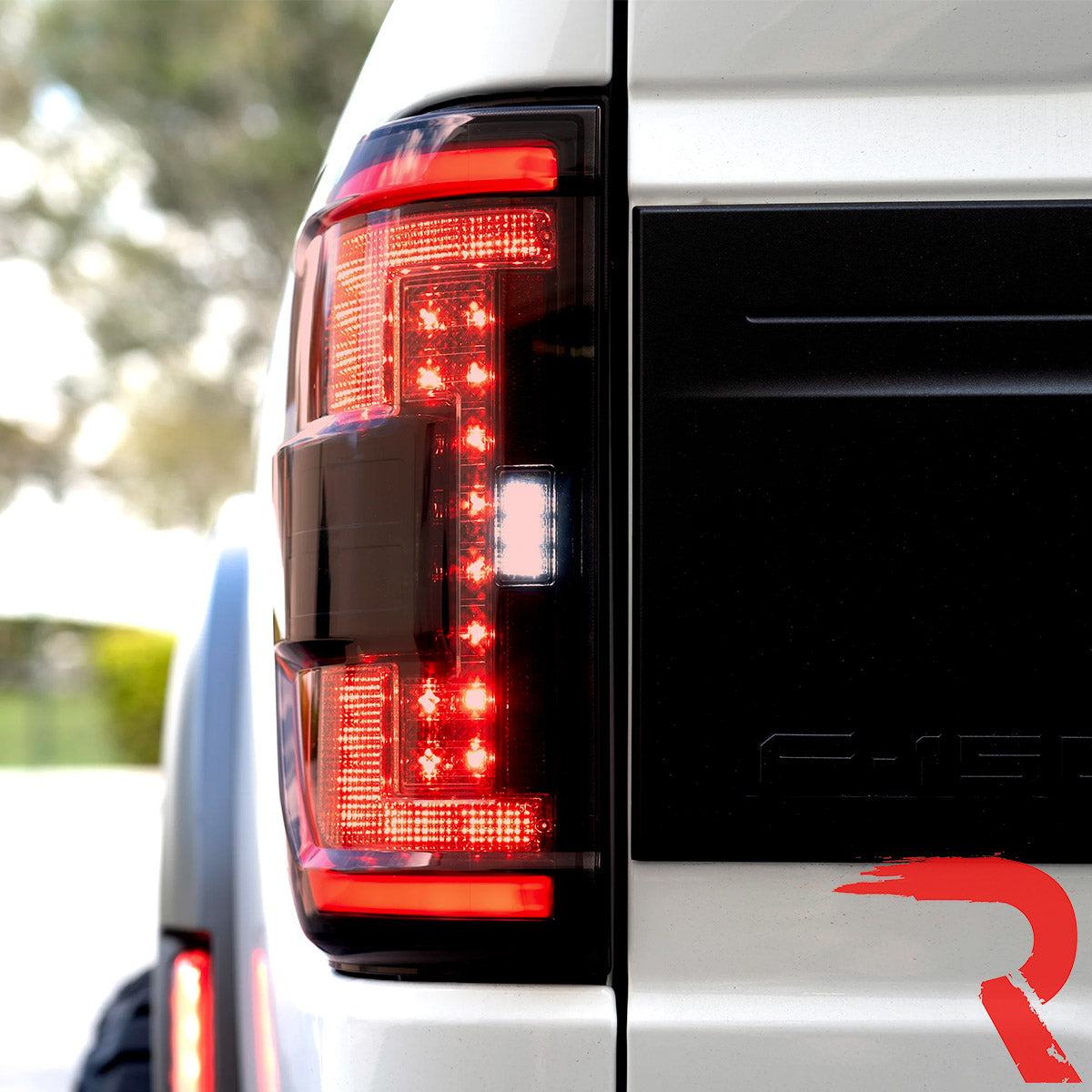 Ford F150 21-23 Ultra Bright OLED Tail Lights w/ Startup Light Sequence (Replaces Factory Halogen Tail Lights w/ BLIS Only) - Multiple Lens