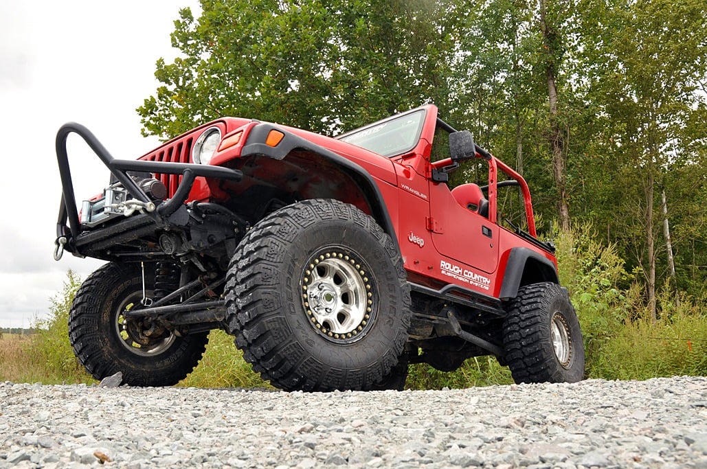4 Inch Lift Kit Long Arm Jeep Wrangler TJ 4WD (1997-2006) Rough Country