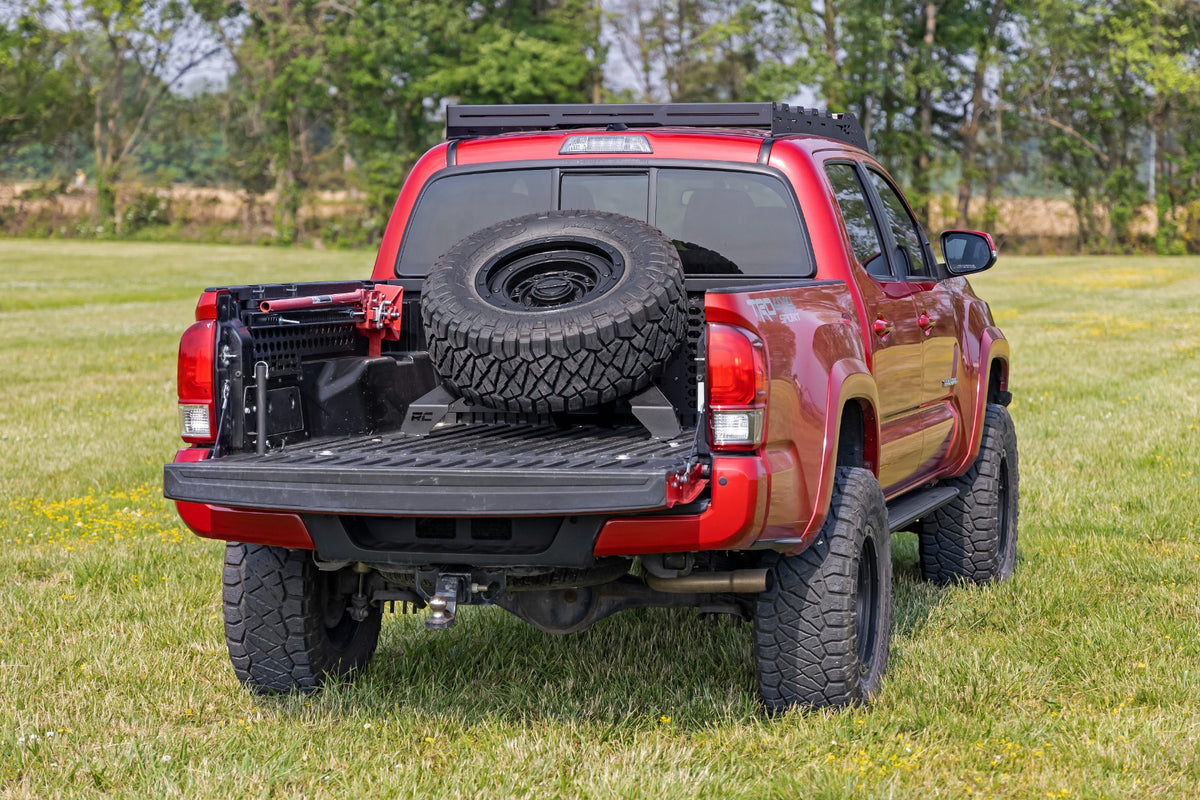 Bed Mount Spare Tire Carrier Universal (5x5.5 6x5.5 6x135 & 5x5.0 Bolt Patterns) Rough Country