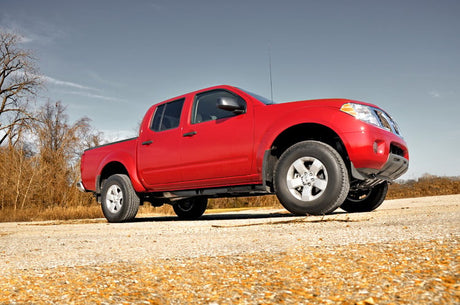 2.5 Inch Leveling Kit Red Spacers Front Nissan Frontier (05-26)/Xterra (05-15) Rough Country