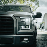Ford F150 15-17 LED Projector Headlights w/ Ultra High Power Smooth White OLED DRL w/ Scanning Amber Turn Signals (Replaces OEM LED Headlights) - Multiple Styles