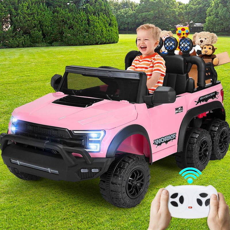Electric 12V Kids Ride On Pickup Truck with MP3, LED Lights, and 6 Wheels in White and Pink