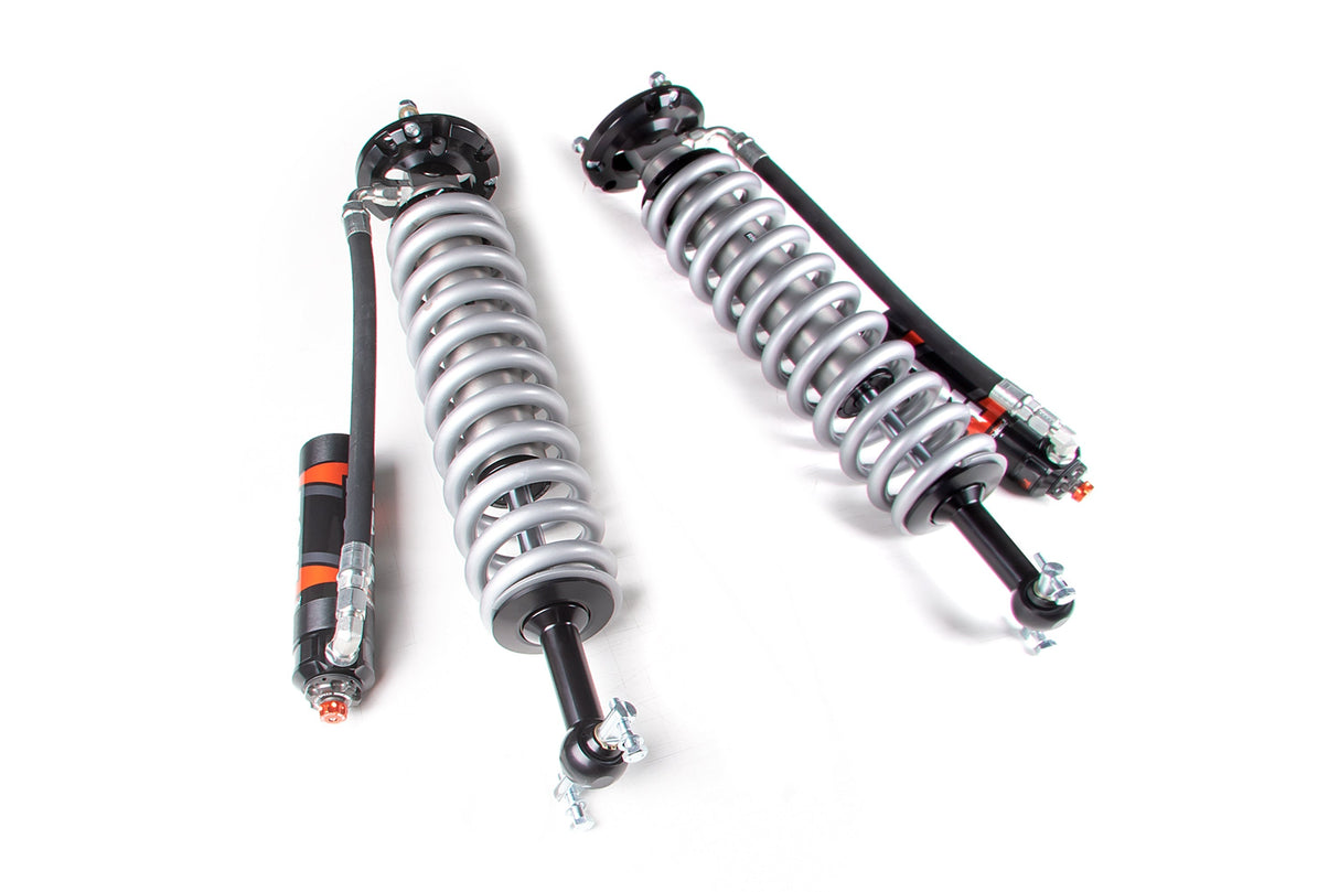 FOX 2.5 Coilover Shocks w/ DSC Reservoir Adjuster | 4 Inch Lift | Performance Elite Series | Chevy Silverado and GMC Sierra 1500 (19-26) FOX