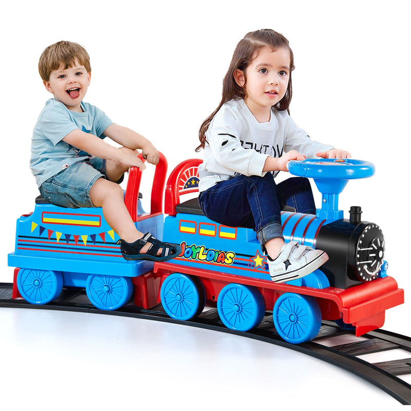 Interactive 6V Electric Kids Train Set with Track, Carriage, Lights, Whistle, Music, Storytelling, and Storage
