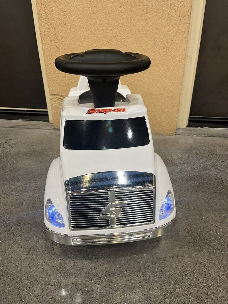Rev Up Your Child's Playtime with the Snap On Tools White Truck Ride-On Toy - Complete with Sound Effects!