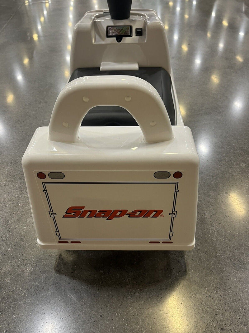 Rev Up Your Child's Playtime with the Snap On Tools White Truck Ride-On Toy - Complete with Sound Effects!