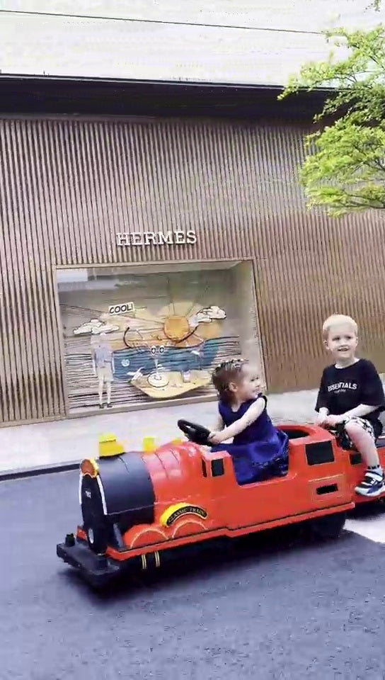 Kids Ride-On Train for Backyard Fun – Battery Powered W/Magic Cars® Remote Control, Real Steam Stack, MP3 & Working Caboose (Ages 1–10)