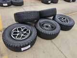 17" Jeep Wrangler Rubicon OEM 95730 9327 wheels rims Gladiator BFG KO2 A/T 35" Texas Truck Tire