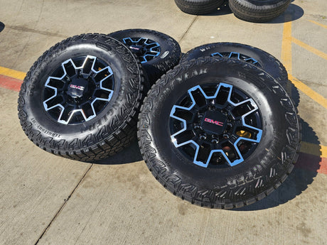18" GMC Sierra AT4X Chevy Trail Boss 2500 OEM 14136 wheels rims GOODYEAR 35" NEW Texas Truck Tire
