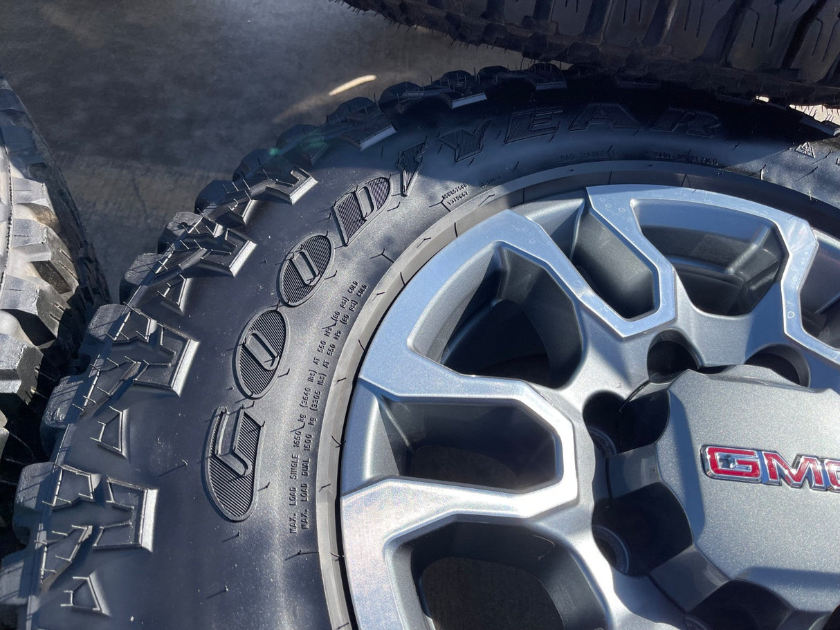 18" GMC Sierra AT4X Chevy Silverado 2500 3500 OEM 5949 wheels rims GOODYEAR A/T Texas Truck Tire