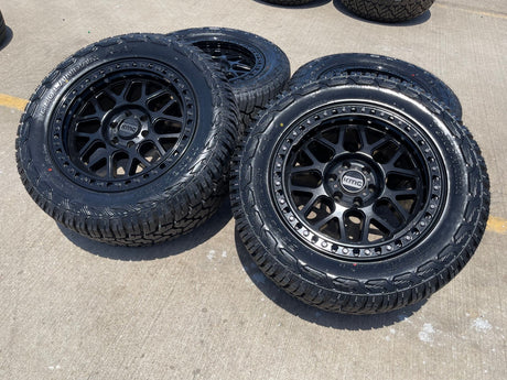 20x9 20" KMC KM549 Ford Expedition F-150 6x135 wheels rims tires 33" NEW Texas Truck Tire