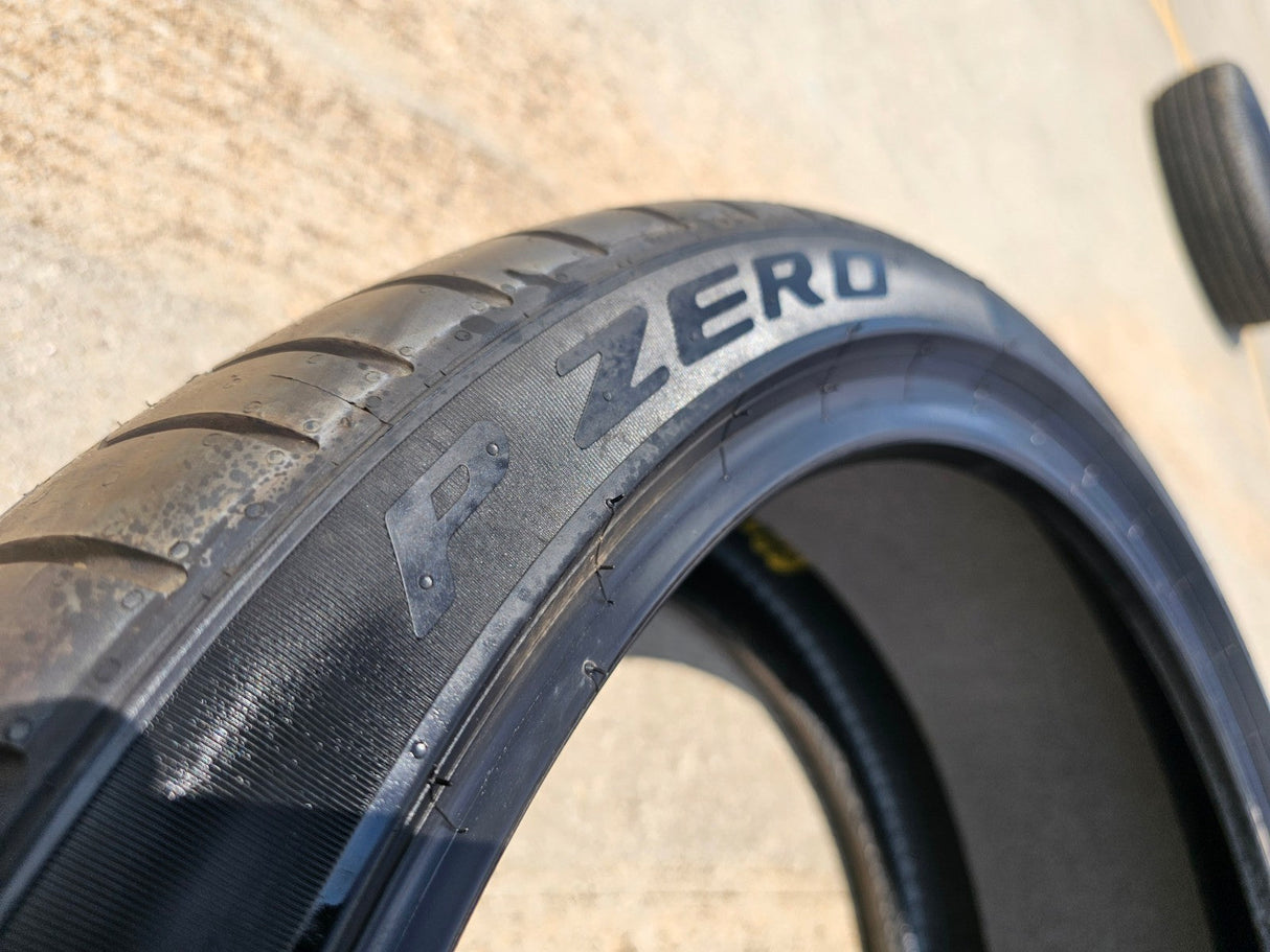 (1) 265/35/21 Pirelli P Zero tire Elect LM1 NEW take off! Texas Truck Tire