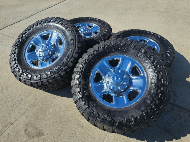 18" Dodge Ram 2500 3500 STEEL chrome OEM 2473 wheels rims TOYO M/T 35" Texas Truck Tire