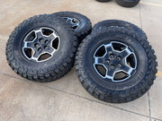 17" Jeep Wrangler RUBICON OEM wheels rims tires 9259 black TOYO 33" Texas Truck Tire