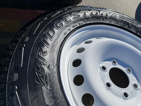 (4) 17" INEOS Grenadier OEM steel wheels rims WHITE tires 2024 2025 2026 NEW Texas Truck Tire
