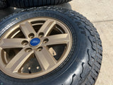 17" Ford F-150 OEM BRONZE Tremor rims wheels tires 10339 FALKEN A/T3 NEW Texas Truck Tire