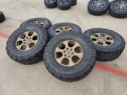 17" Ford Bronco 10384 OEM wheels rims BRONZE tires Ranger 35" M/T Texas Truck Tire