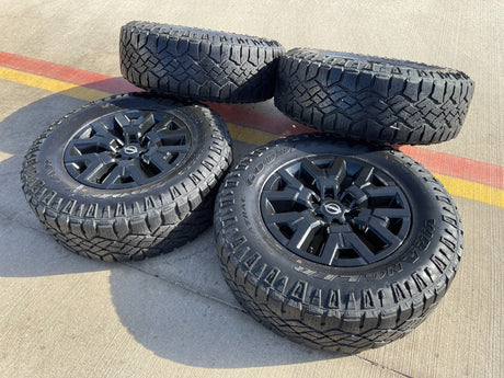 17" Nissan Frontier OEM Desert Runner 62832 wheels rims tires DURATRAC A/T Texas Truck Tire